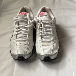 Nike White Sneakers with Pink Accents